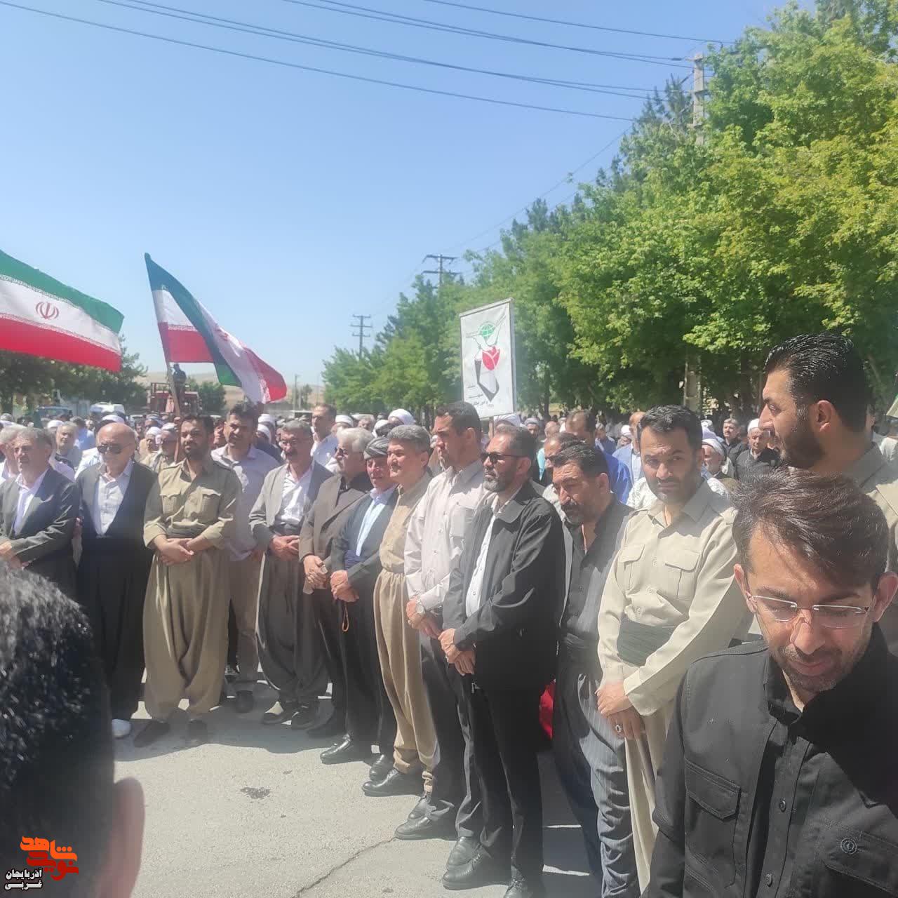 تجمع مردم ،خانواده ایثارگران و شهدا در شهر مهاباد در محکومیت جنایات رژیم صهیونیستی و آمریکا