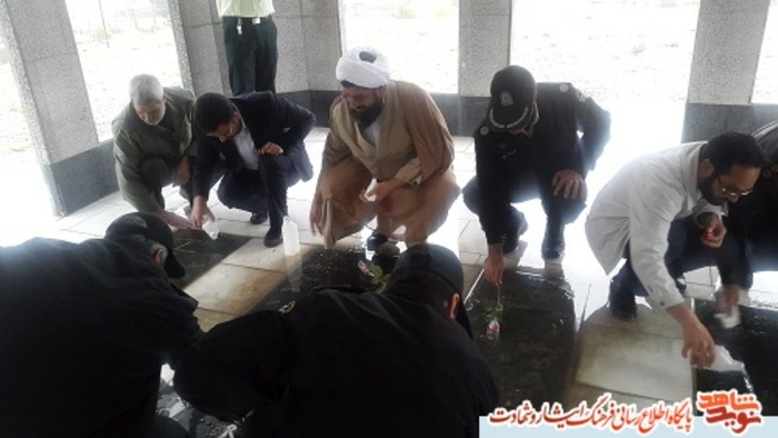 آیین غباروبی گلزار ملکوتی شهدا حاجی آباد بهمن ماه 95
